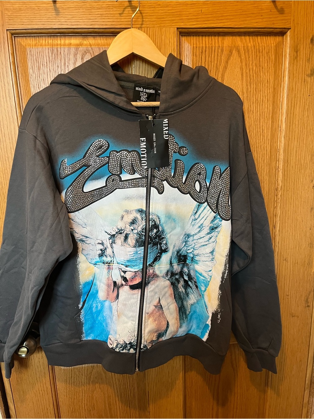 Mixed Emotions Black Hoodie with Blue and Cream Angel Print